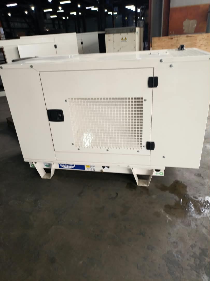 FG Wilson 12.5 kVA diesel generator in a white soundproof canopy