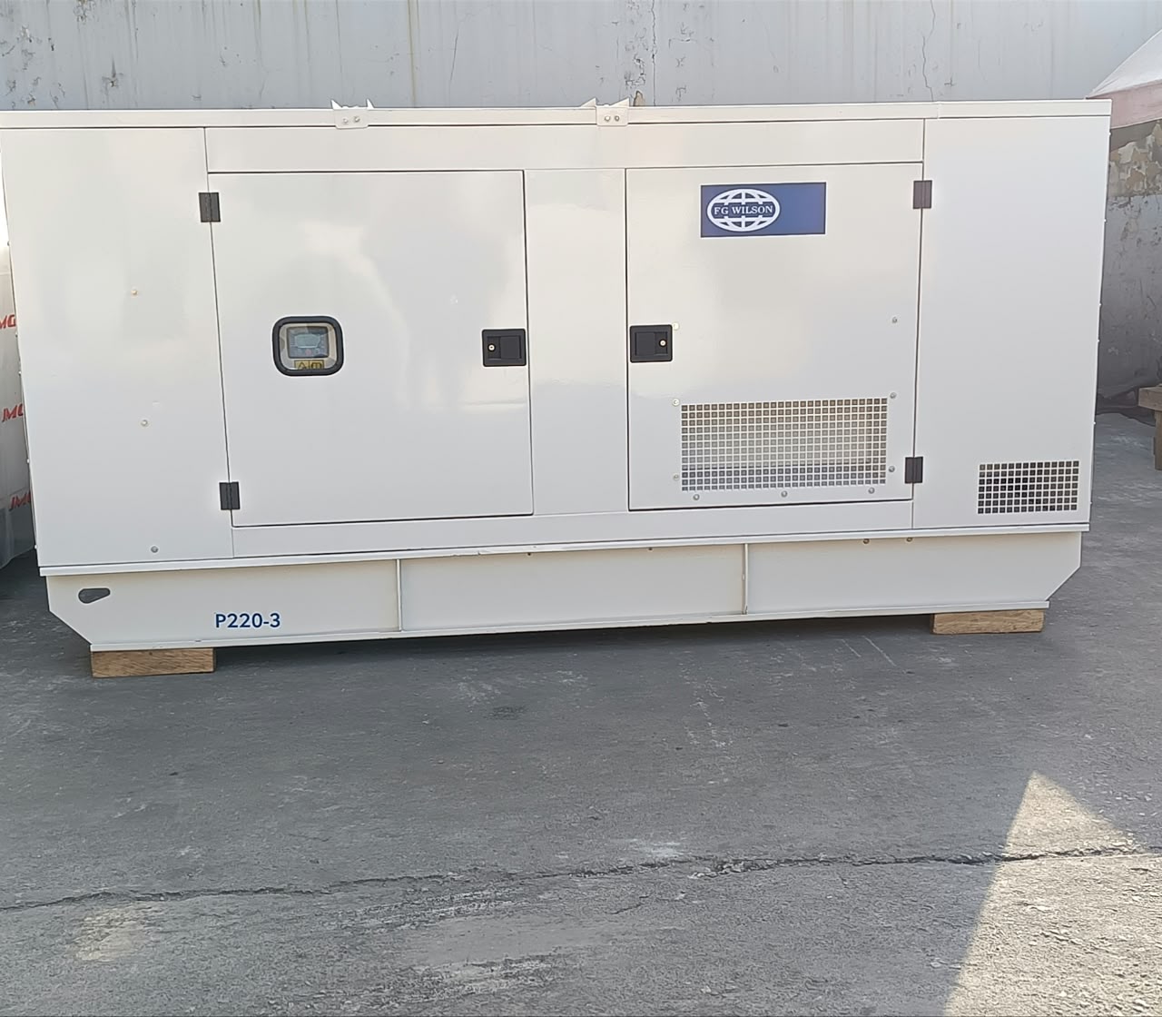 FG Wilson 200 kVA diesel generator in a white soundproof canopy
