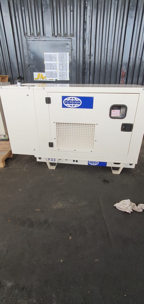 FG Wilson P33 30 kVA diesel generator in a white soundproof canopy